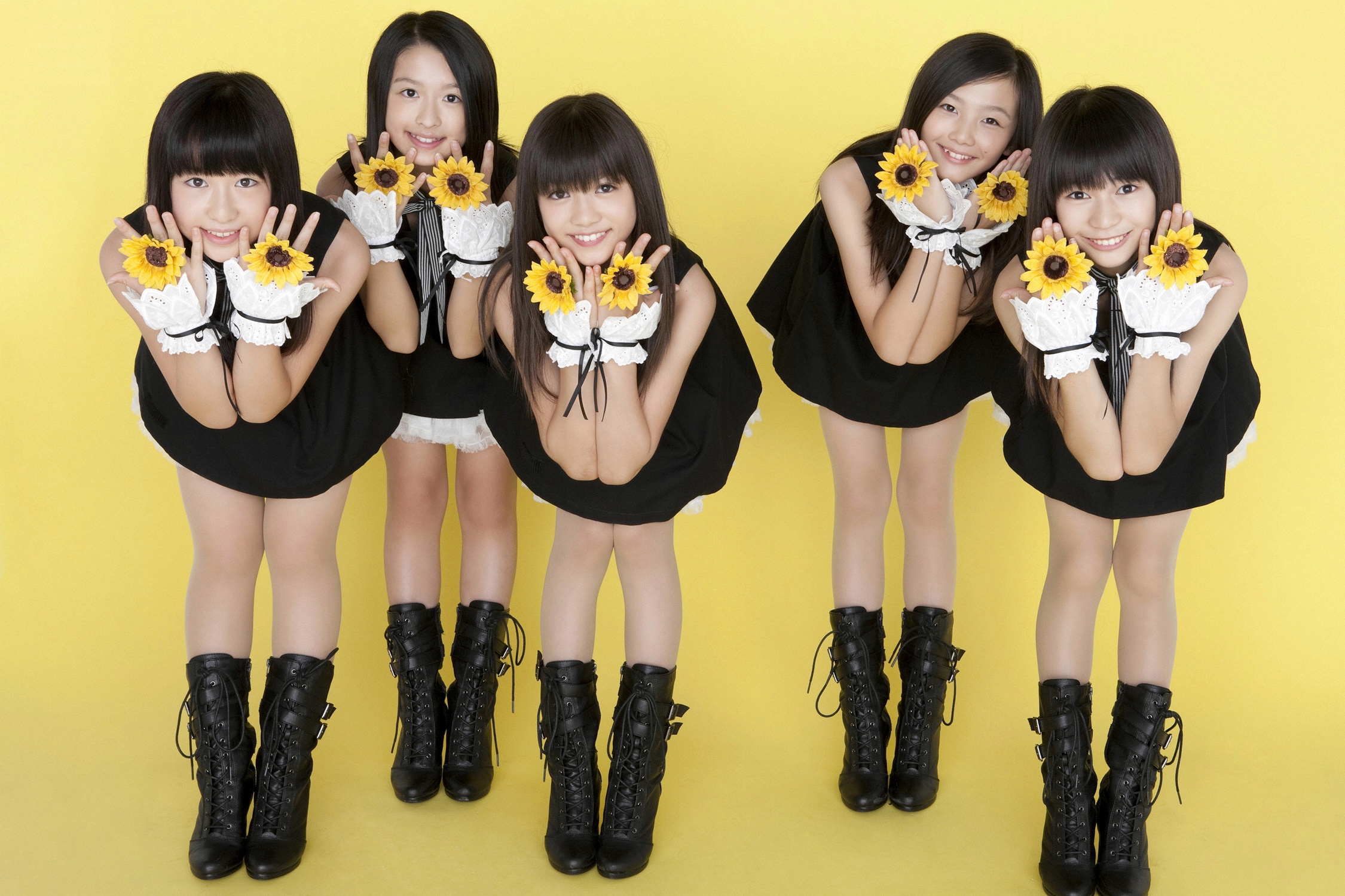 Five Brunette Asian Schoolgirls with Bare Legs wearing Black Boots
